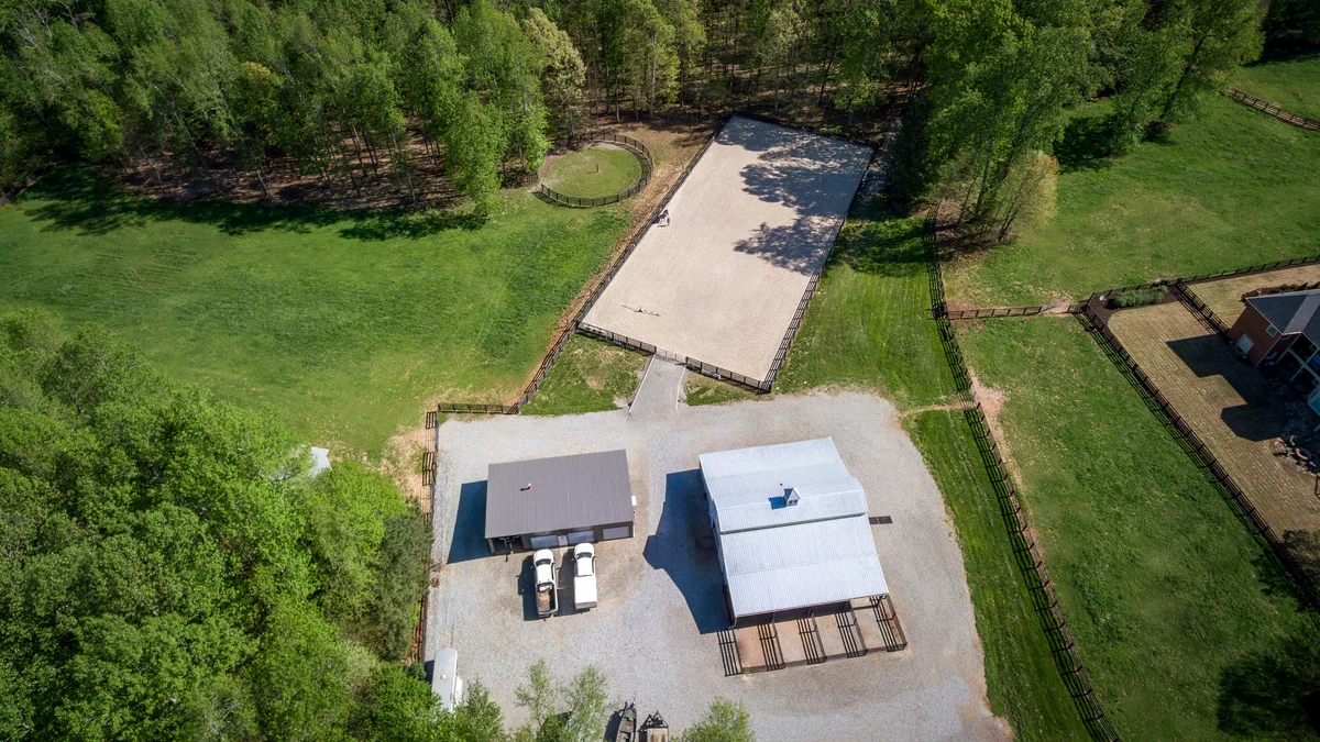 Aerial view of the McBriar Farm barns, pastures, round pen, and arena